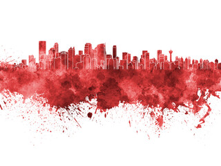 Calgary skyline in red watercolor on white background