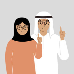 Smiling muslim couple, good mood concept. Positive emotions, happy people, boyfriend and girlfriend showing thumbs up, fun and joy.