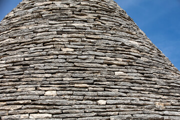 Stone roof of Trulli House in Alberobello; Italy. The style of construction is specific to the...