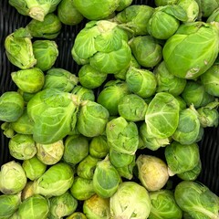 Brussels sprouts cabbage fresh green fruit on the counter market store healthy meal food diet snack copy space food background rustic top view keto or paleo diet veggie vegan or vegetarian