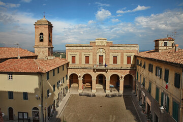 Lari, Casciana Terme, Pisa, Tuscany, Italy: the main square Piazza delle Logge with the former Casa del Fascio, in the old town of the ancient Tuscan village - 497677837