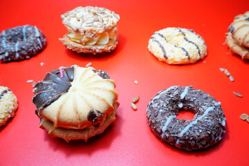 Happy Valentine’s Day. Heart cookies on red background. Healthy eating habits concept. Top view. Free text space.