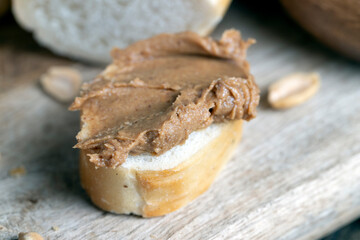 nut food on a cutting wooden board in the kitchen