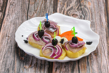 Herring fillet snack with potato