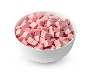 Boiled sausage cut into cubes in a cup is isolated on a white background.