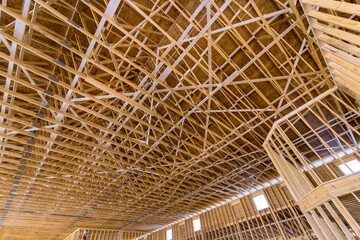 Beginning unfinished roof trusses construction with home the frame of house
