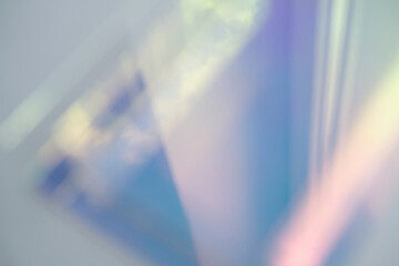 blurred soft rainbow light flares background or overlay. double exposure. blurry reflection of the...