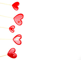Lollipops hearts on white background. Congratulations, space for text.