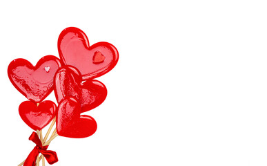 Lollipops hearts on white background. Congratulations, space for text.