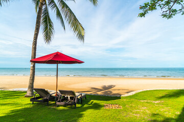 Umbrella and chair  with sea ocean view in hotel resort