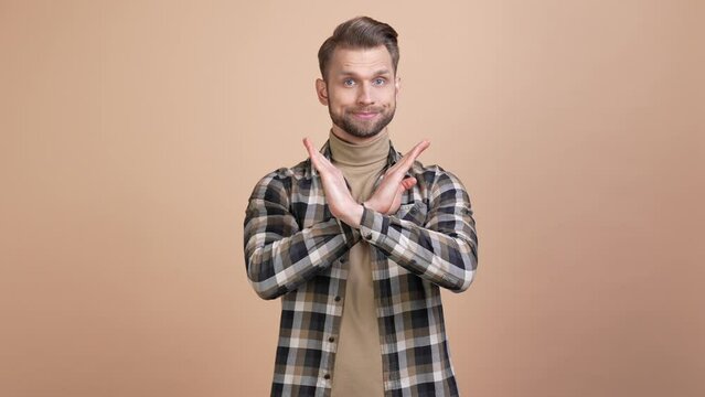 Strict guy make you stop symbol cross x arms isolated pastel color background 