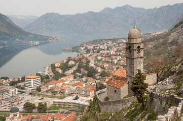 Fototapeta na wymiar Kotor, Montenegro.Kotor, Montenegro. Town' panorama from the steep ascent to the castle.