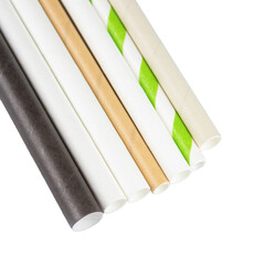 Paper straws of different colours isolated on white background. Biodegradable drinking straws. Sustainable lifestyle and zero waste concept. Mockup, closeup view