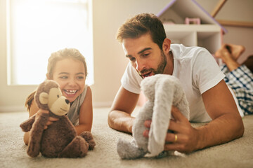 Does he have a name. Shot of a handsome young man and his daughter playing with stuffed toys on her bedroom floor.
