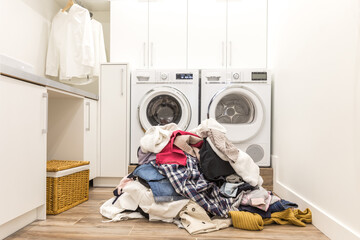 Laudry room with a pile of dirty clothes