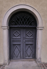 
Old door. There are many beautiful historical buildings and temples in Warsaw. Warsaw (Poland).