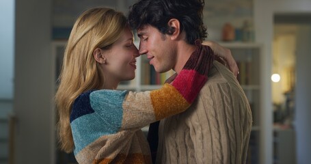Cinematic authentic close up shot of young happy smiling just married couple enjoying time together...