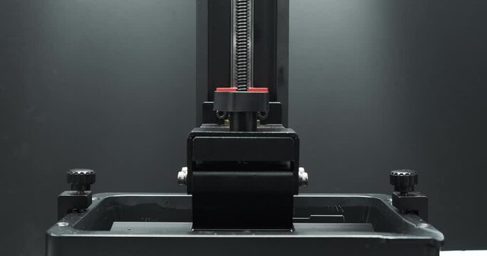 Timelapse 3D printing, resin MSLA 3D printer lifting up an 3D printing odject