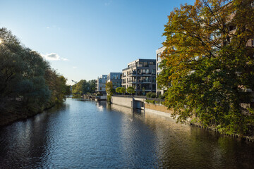 Osterbekkanal in Winterhude with residential houses in prime location, Hamburg, Germany.