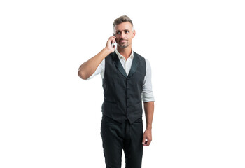 Manager in semi-formal suit vest talking on mobile phone isolated on white