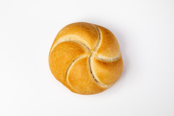 Top view of Kaiser roll on white table.