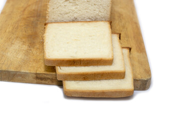 bread slices on a wooden cutting board