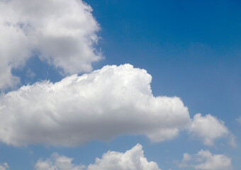 white clouds on the blue sky background