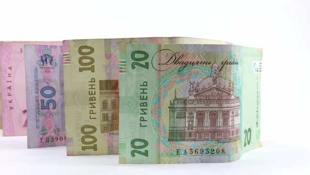 Paper money different denominations, Ukrainian hryvnia in denominations 20, 50,100, 200, 500 hryvnias, new money, isolated on white background
