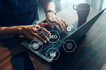 Closeup businessman working remotely at office, SEO search engine optimization concept diagram with...