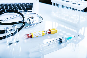 blood test tube with mockup is on the doctor's table close up