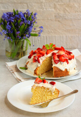 Coconut cake with yogurt and strawberry topping