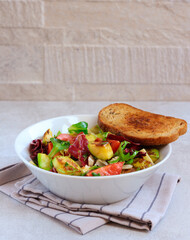 Grilled zucchini salad with toast