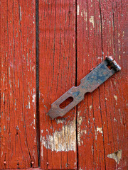 door lock for key closing, keyhole, hasp bolt. Collection of old vintage retro locks on the textured colored door. Close-up