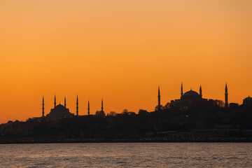 Istanbul skyline with Hagia Sophia and Blue Mosque .at sunset