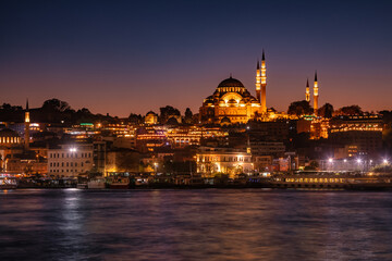 Fototapeta na wymiar Istanbul cityscape with illuminated Suleymaniye Mosque