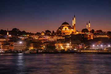 Istanbul cityscape with illuminated Suleymaniye Mosque