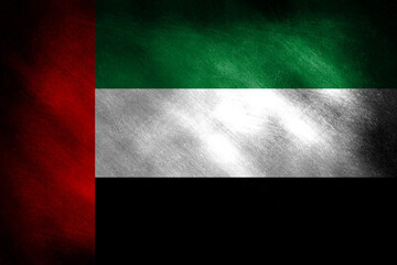 The flag of the United Arab Emirates on a grunge background
