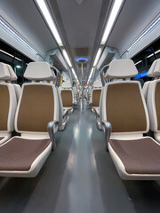 Fototapeta premium empty seats in the train car, mode of transportation