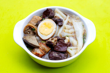 Boiled Chinese pasta square with pork soup