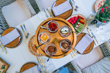Decorated catering banquet table with different food appetizers assortment on a party