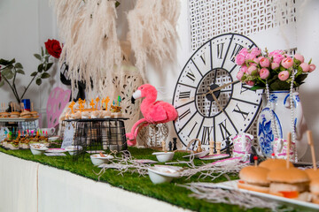 Decorated catering banquet table with different food appetizers assortment on a party