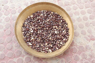 Tamarind seeds isolated on floor background