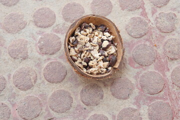 Tamarind seeds isolated on floor background