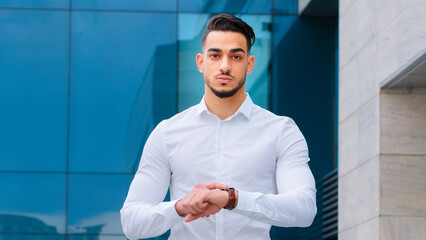 Portrait serious upset impatient hispanic man bearded guy disgruntled businessman wears formal...