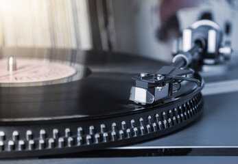 close up of turntable, needle and vinyl cartridge
