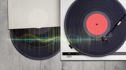 vinyl record player and vinyl discs on wooden background. Retro music and audiophile sound concept