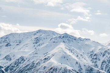 Fototapeta na wymiar Snow-covered peaks of the Kyrgyz Ala-Tau