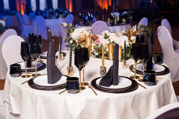 Decorated catering banquet table with different food appetizers assortment on a party