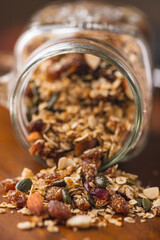 Granola of Oatmeal, Pecans, Nuts, Oats, Dates, Pine Nut Spread from a Jar