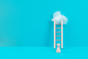 Man is standing next to a ladder, climbing up in career, having a goal, brainstorming for ideas,...